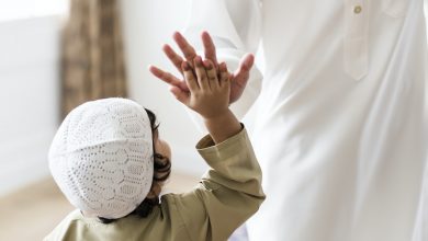 Muslim boy giving a high five
